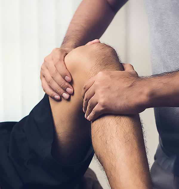 Physiotherapist Treating Joint Replacement and Repair